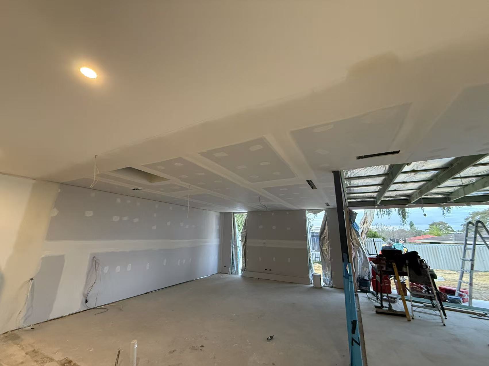Vaulted ceiling with plasterboard partially installed